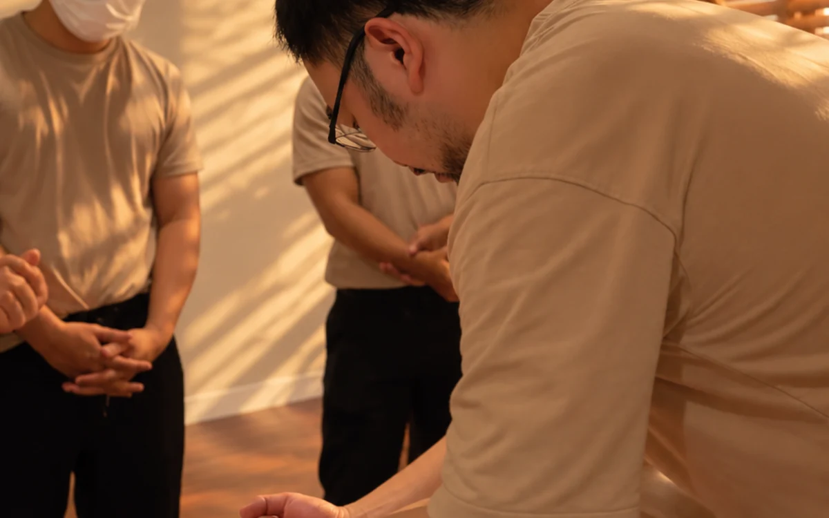 A therapist attending to a guest’s back
